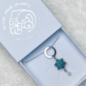 Northern Lights in Magical Snowflake Wooden Sterling Silver 925 with Pearl -necklace brings the magical northern winter and northern lights to you